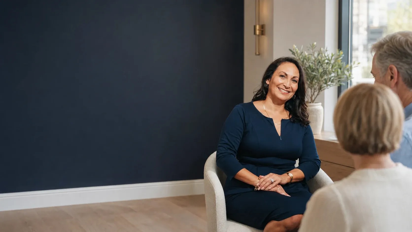 Colina Law team member discussing estate planning with clients